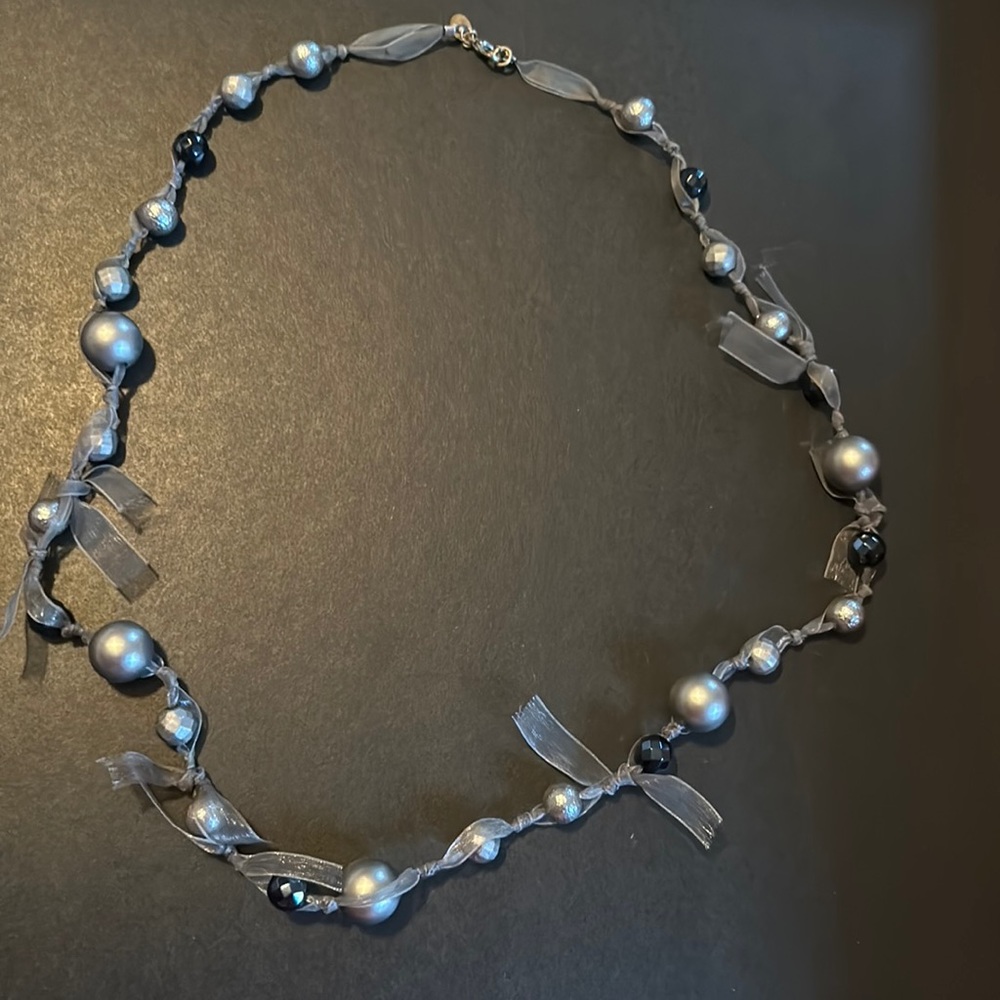 Beaded and ribboned necklace